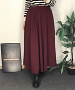 Skirt on model in #7c2a3e